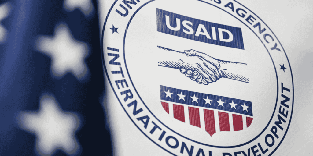 logo of united nations agency international development in press conference about cutting usaid funds